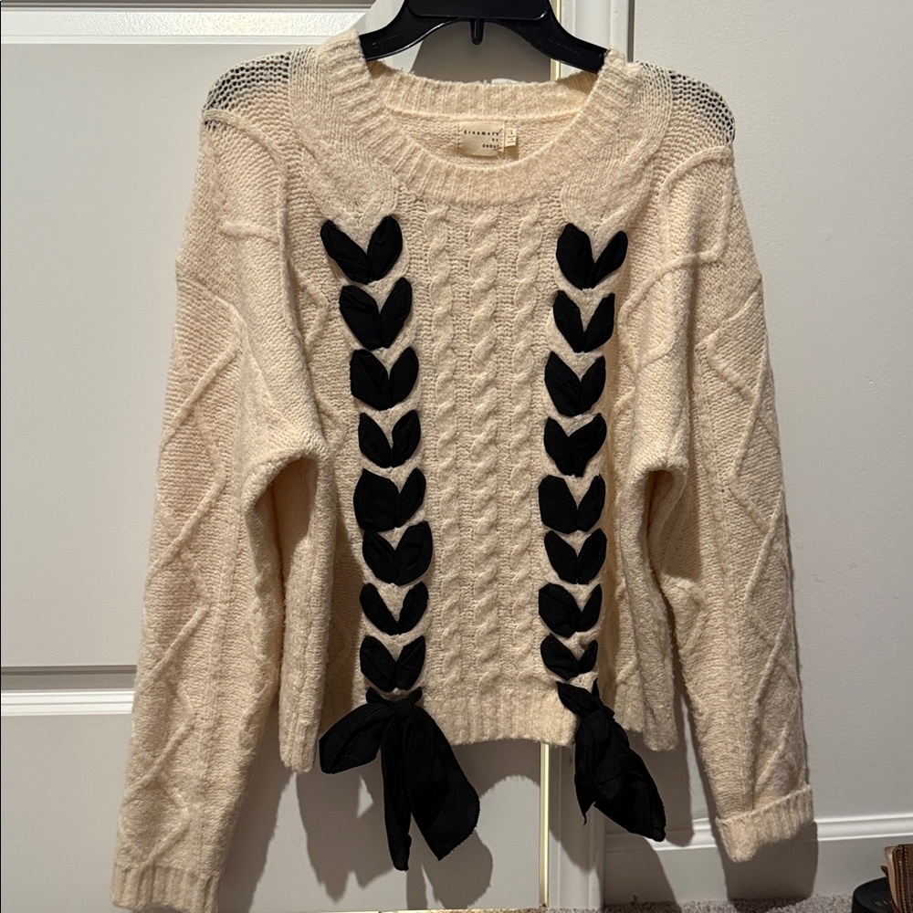 Chic Cream Sweater with Black Accents